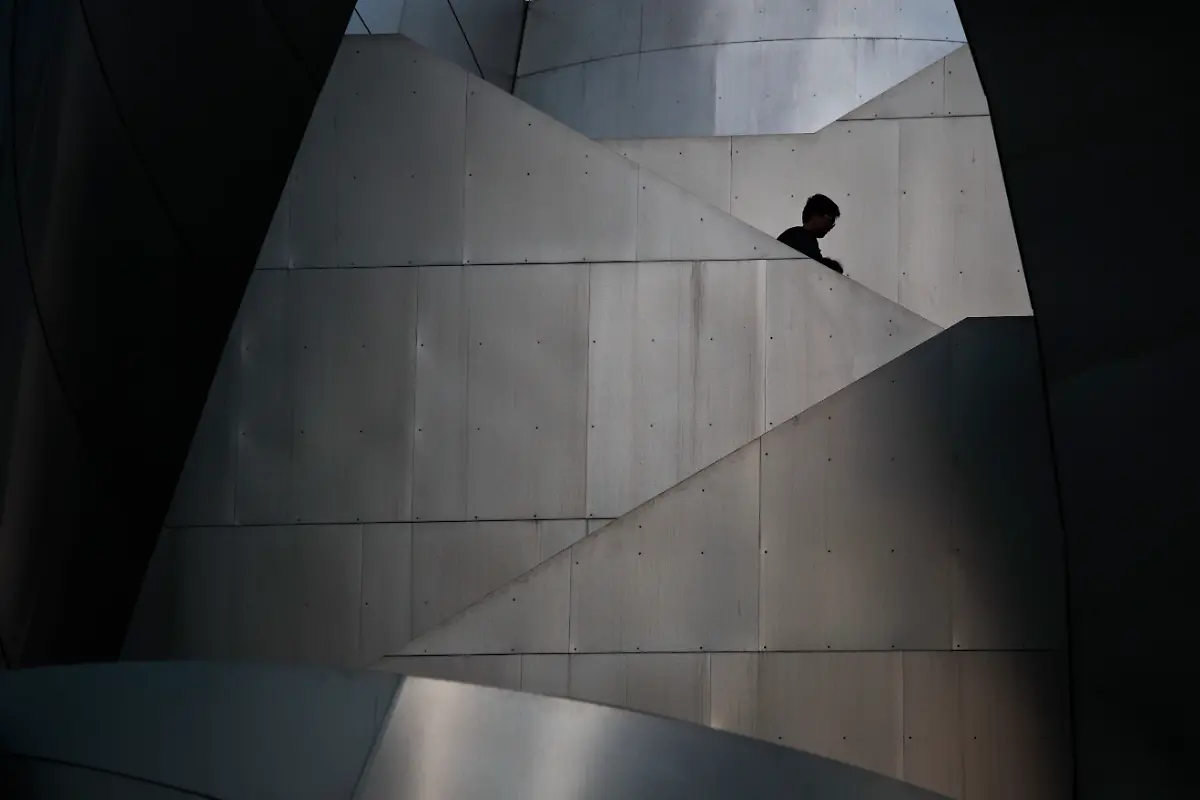 Two-visitors-walk-down-the-steps-of-the-Walt-Disney-Concert-Hall-Friday-Jan-12-2018-in-Los-Angeles-The-building-was-designed-by-architect-Frank-Gehry-AP-Photo-Jae-C