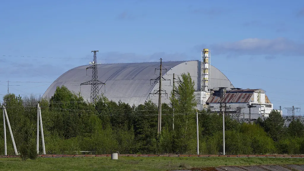 Photo-shows-the-Chernobyl-nuclear-power-plant-covered-with-a-dome-like-shelter-in-northern-Ukraine-on-April-26-2025-the-39th-anniversary-of-the-nuclear-disaster