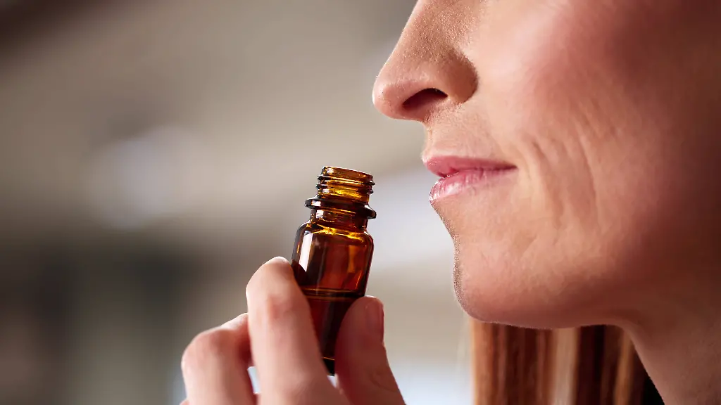 The-Herbalist-A-Young-Woman-Embracing-Aromatherapy-Essential-Oil-The-Herbalist-A-Young-Woman-Embracing-Aromatherapy-Essential-Oil-Therapy-model-released-94484804