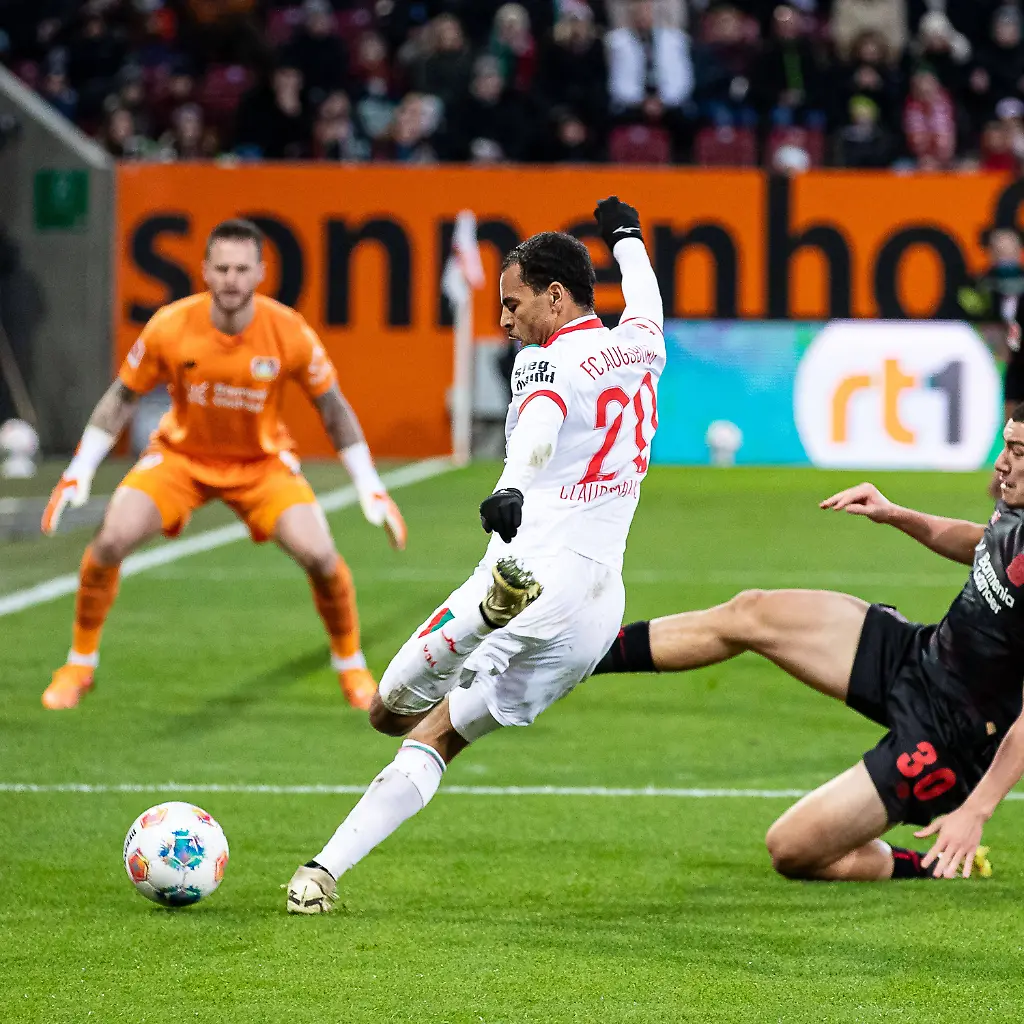 angriff-von-Alexis-Claude-Maurice-FC-Augsburg-20-vs-Ibrahim-Maza-Bayer-04-Leverkusen-30-GER-FC-Augsburg-vs-Bayer-04-Leverkusen-1-Bundesliga-Fussball-13-Spieltag-Saison-2025-2026-06-12-2025-DFB-DFL-REGULATIONS-PROHIBIT-ANY-USE-OF-PHOTOGRAPHS-AS-IMAGE-SEQUENCES-AND-OR-QUASI-VIDEO-GER-FC-Augsburg-vs-Bayer-04-Leverkusen-1-Bundesliga-Fussball-13-Spieltag-Saison-2025-2026-06-12