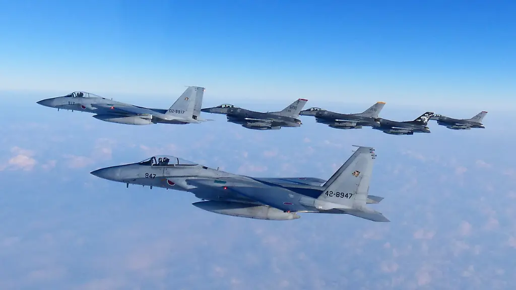 This-photo-released-by-the-Joint-Staff-of-Japanese-Self-Defense-Force-shows-two-F-15-warplanes-foreground-and-rear-left-of-the-Japanese-Self-Defense-Force-and-four-F-16-fighters-of-the-U-S-Air-Force-during-a-bilateral-exercise-Sunday-Feb-19-2023-The-United-States-responded-by-flying-long-range-supersonic-bombers-Sunday-for-separate-joint-exercises-with-South-Korean-and-Japanese-warplanes-in-a-show-of-force-against-North-Korea