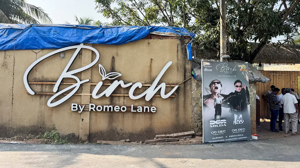 People-stand-outside-the-Birch-by-Romeo-Lane-nightclub-which-has-been-sealed-for-investigation-following-a-fire-that-killed-multiple-people-in-Goa-India-December-7-2025