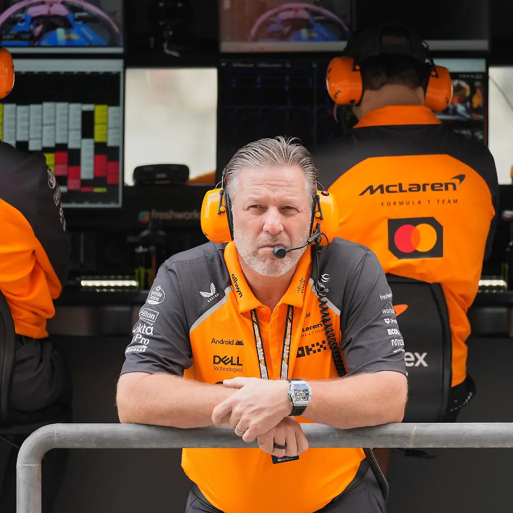 McLaren-chief-Zak-Brown-listens-to-radio-during-a-first-practice-for-the-he-Abu-Dhabi-Formula-One-Grand-Prix-in-Abu-Dhabi-United-Arab-Emirates-Friday-Dec-5-2025