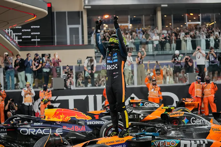 McLaren-driver-Lando-Norris-of-Britain-reacts-after-becomin-a-rold-champion-after-the-Abu-Dhabi-Formula-One-Grand-Prix-in-Abu-Dhabi-United-Arab-Emirates-Sunday-Dec-7-2025