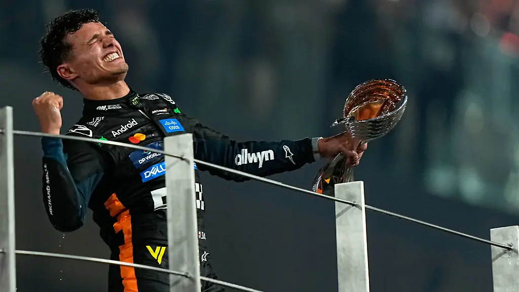 McLaren-driver-Lando-Norris-of-Britain-celebrates-after-becoming-a-world-champion-after-the-Formula-One-Abu-Dhabi-Grand-Prix-at-the-Yas-Marina-Circuit-in-Abu-Dhabi-UAE-Sunday-Dec-7-2025