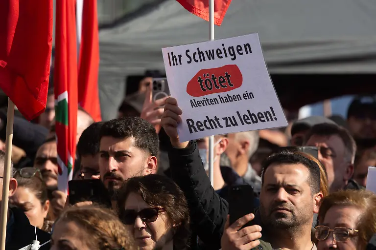 Demonstration-Against-Killing-And-Violence-Against-Alawites-In-Syria-In-Cologne-Thousands-of-people-take-part-in-a-large-demonstration-against-killing-and-violence-against-the-Alawite-minority-in-Syria-in-Cologne-Germany-on-March-15-2025-as-reported-by-the-Syrian-Observatory-for-Human-Rights-which-states-that-more-than-a-thousand-civilians-are-killed-by-security-forces-after-the-toppling-of-President-Bashar-al-Assad-Cologne-Germany-PUBLICATIONxNOTxINxFRA-Copyright-xYingxTangx-originalFilename-tang-notitle250315-npDAE