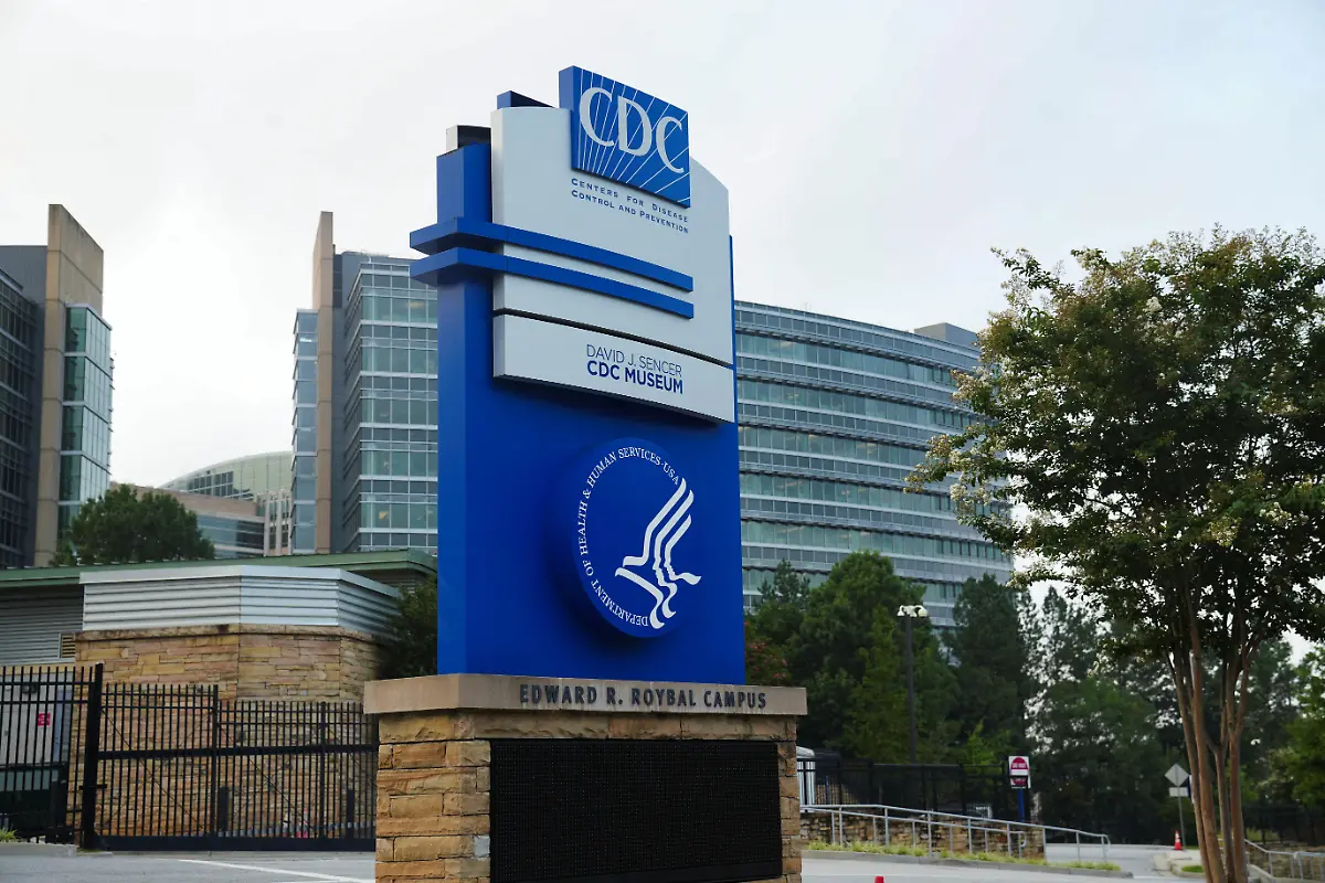 The-logo-of-Center-of-Disease-Control-and-Prevention-CDC-is-seen-as-the-glass-of-it-s-building-in-the-background-is-pockmarked-by-bullet-holes-following-a-deadly-shooting-incident-in-Atlanta-Georgia-U-S-August-9-2025