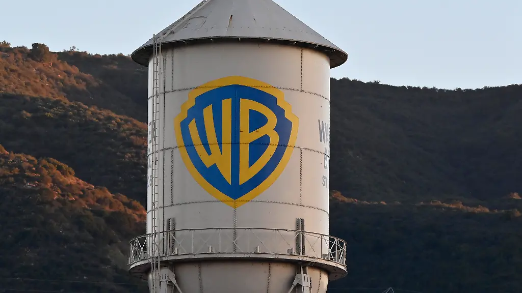 A-water-tower-is-seen-on-the-Warner-Bros-Studios-lot-in-Burbank-California-on-Sunday-December-7-2025-Netflix-agreed-to-buy-Warner-Bros-Discovery-in-a-deal-valued-at-82-7-billion-after-securing-financing-from-a-group-of-banks