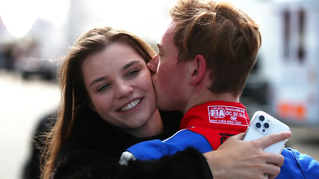 ZANDVOORT-NETHERLANDS-SEPTEMBER-03-David-Schumacher-of-Germany-and-Trident-celebrates-with-girlfriend-Vivien-Keszthelyi-after-qualifying-ahead-of-Round-6-Zandvoort-of-the-Formula-3-Championship-at-Circuit-Zandvoort-on-September-03-2021-in-Zandvoort-Netherlands