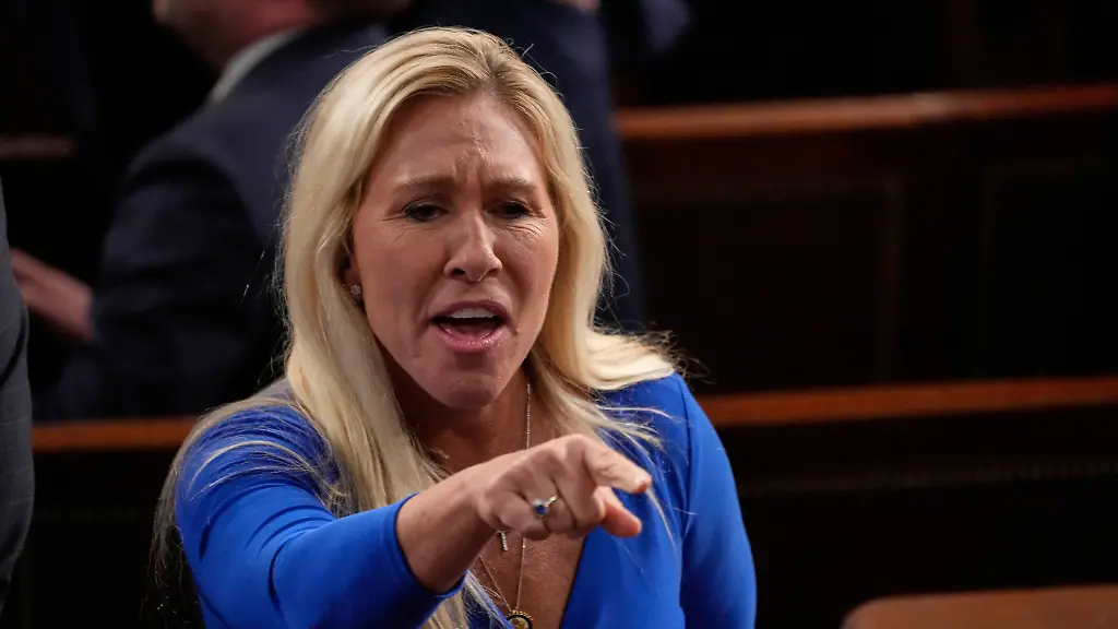 Rep-Marjorie-Taylor-Greene-R-Ga-talks-before-President-Donald-Trump-addresses-a-joint-session-of-Congress-in-the-House-chamber-at-the-U-S-Capitol-in-Washington-Tuesday-March-4-2025
