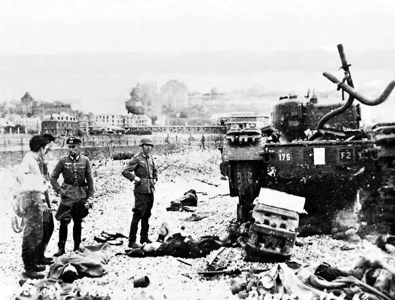 WW2-After-the-raid-on-Dieppe-19th-August-1942-Dead-and-wounded-beside-a-captured-Churchill-tank
