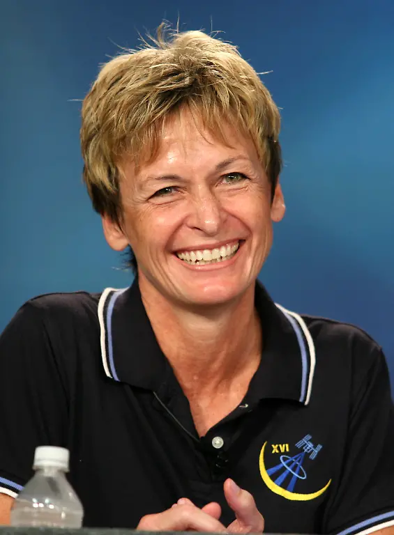 International-Space-Station-Expedition-16-Commander-Peggy-Whitson-of-the-U-S-the-first-female-station-commander-smiles-as-she-reacts-to-a-question-during-a-news-conference-with-members-of-her-International-Space-Station-crew-at-the-Johnson-Space-Center-in-Houston-July-23-2007