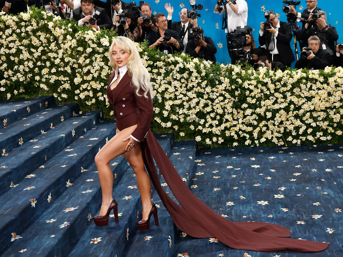Sabrina-Carpenter-arrives-on-the-red-carpet-at-the-2025-Met-Gala-celebrating-the-opening-of-Superfine-Tailoring-Black-Style-at-The-Metropolitan-Museum-of-Art-on-Monday-May-5-2025-in-New-York-City