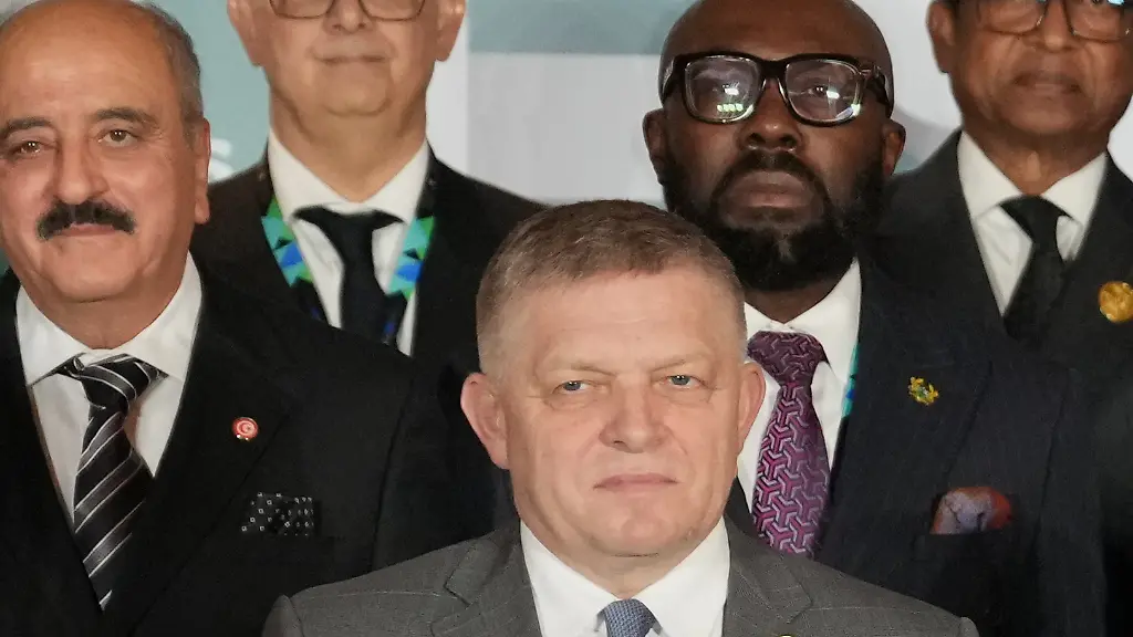 In-this-Monday-Nov-24-2025-photo-Slovakia-s-Prime-Minister-Robert-Fico-center-poses-for-a-group-photo-during-of-the-African-Union-European-Union-summit-in-Luanda-Angola