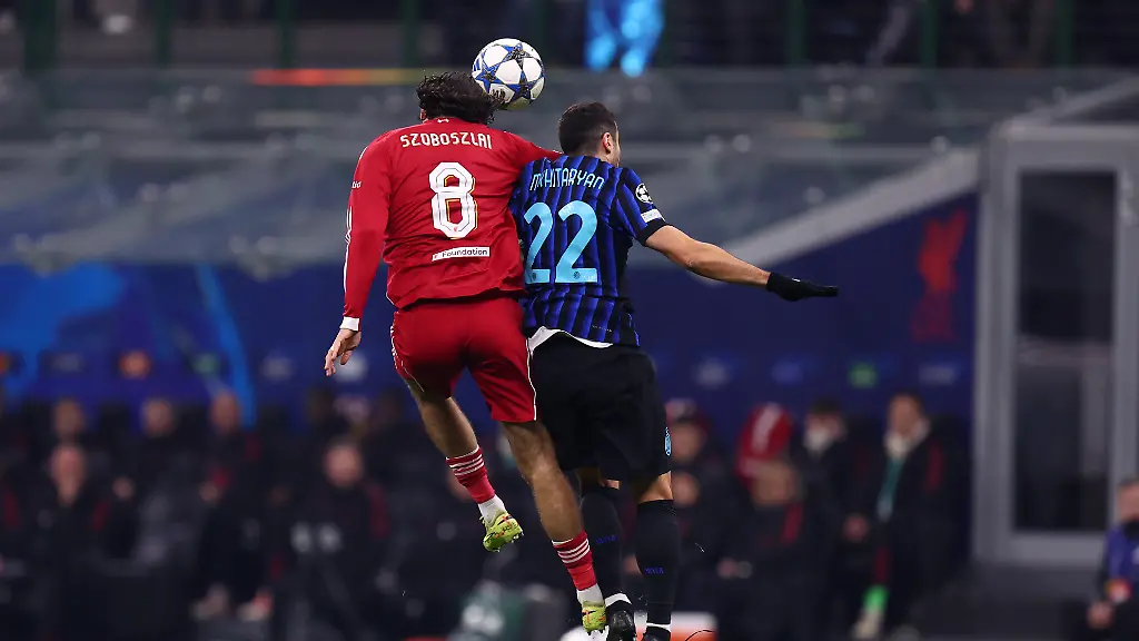 Henrikh-Mkhitaryan-of-Fc-Internazionale-and-Dominik-Szoboszlai-of-Liverpool-Fc-battle-for-the-ball-during-the-UEFA-Champions-League-2025-26-League-Phase-MD6-match-between-FC-Internazionale-Milano-and-Liverpool-Fc-at-Stadio-San-Siro-on-December-9-2025-in-Milan-Italy