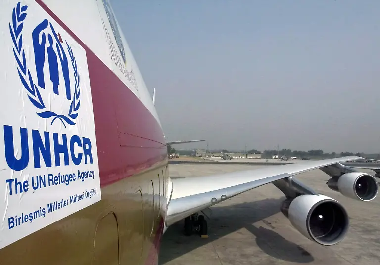 A-UNHCR-chartered-Kalitta-Air-cargo-plane-on-Wednesday-26-October-2005-in-Islamabad-Pakistani-and-International-rescue-and-relief-workers-are-engaged-in-relief-and-rescue-operations-in-the-affected-mountain-regions-where-a-massive-earthquake-killed-more-than-51-300-people-and-displaced-hundreds-and-thousands-who-are-living-without-shelter-in-freezing-temperatures