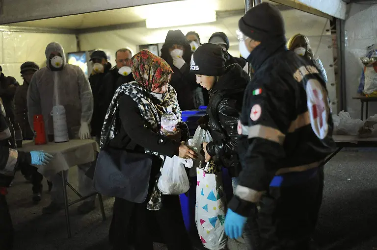 Italy-Corigliano-Calabro-Cosenza-January-03-2015-Abandoned-migrant-ship-Ezadeen-arrives-in-Corigliano-Calabro-Calabria-region-The-ship-carrying-450-migrants-including-children-and-pregnant-women-most-of-who-are-believed-to-be-Syrian-was-abandoned-by-smugglers-and-left-drifting-without-a-crew-on-rough-sea-This-is-the-second-such-case-in-just-2-days