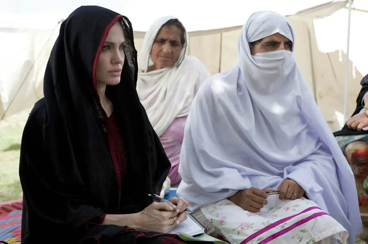 NOWSHERA-PAKISTAN-SEPT-07-UNHCR-Goodwill-Ambassador-Angelina-Jolie-talks-with-flood-affected-women-during-her-visits-at-Kandaro-II-Camp-in-Nowshera-on-Tuesday-September-07-2010-PPI-Images