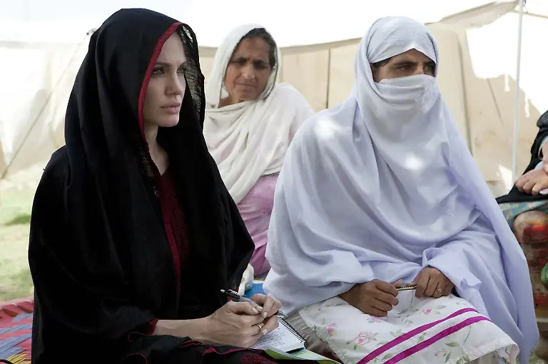 NOWSHERA-PAKISTAN-SEPT-07-UNHCR-Goodwill-Ambassador-Angelina-Jolie-talks-with-flood-affected-women-during-her-visits-at-Kandaro-II-Camp-in-Nowshera-on-Tuesday-September-07-2010-PPI-Images