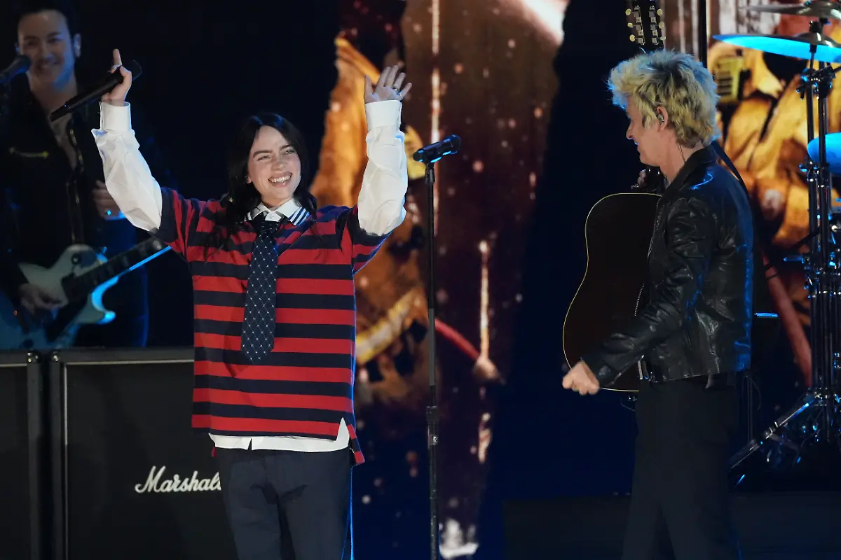 Billie-Eilish-left-performs-with-Billie-Joe-Armstrong-of-Green-Day-during-the-FireAid-benefit-concert-on-Thursday-Jan-30-2025-at-The-Forum-in-Inglewood-Calif