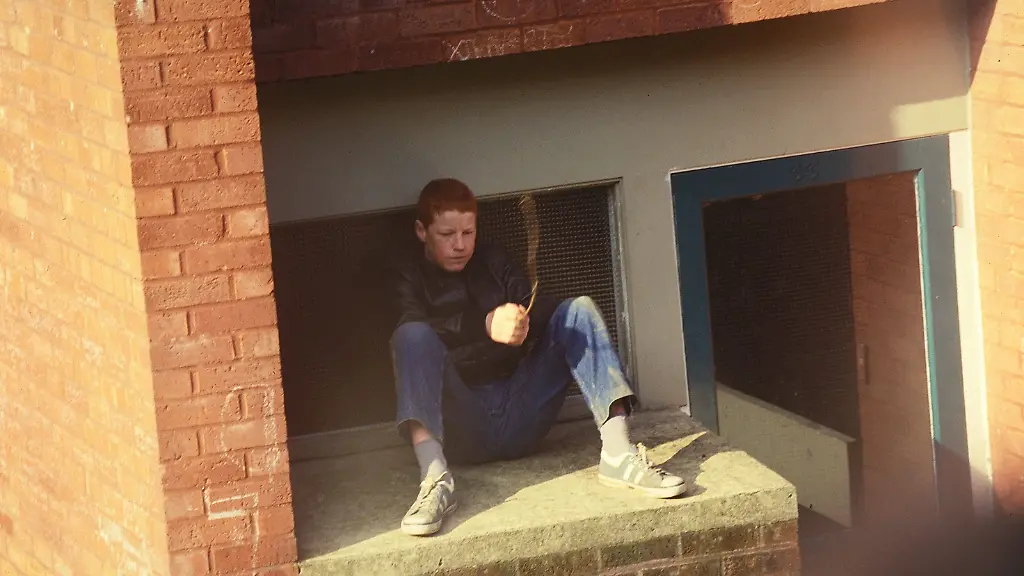 Bored-boy-playing-on-a-housing-estate-Wycombe-UK-1980-s