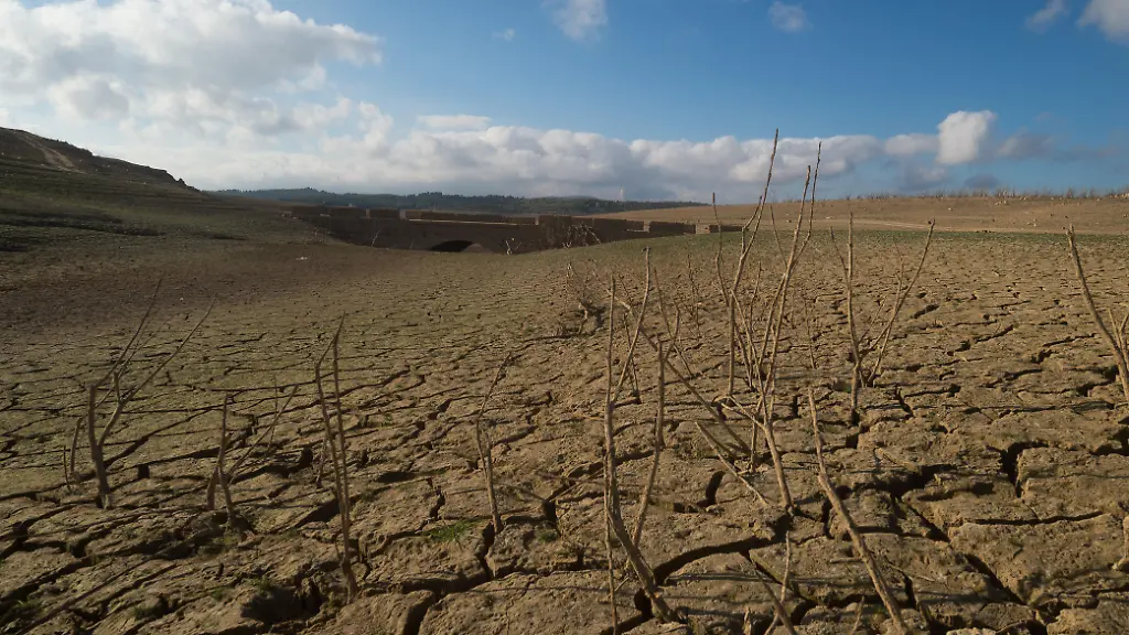 An-old-bridge-part-of-rests-of-the-disappear-village-of-Penarrubia-is-visible-in-the-Guadalteba-reservoir-due-to-low-water-levels-amid-the-severe-drought-in-Andalusia-Andalusia-s-reservoirs-are-at-minimum-levels-as-a-result-of-the-severe-drought-in-Spain-due-to-the-lack-of-rainfall-in-recent-years-The-Andalusian-Government-has-taken-measures-to-limit-the-amount-of-water-used-in-some-Andalusian-villages-and-is-preparing-to-allow-ports-to-receive-ships-loaded-with-water-from-other-countries-to-help-replenish-the-reserves