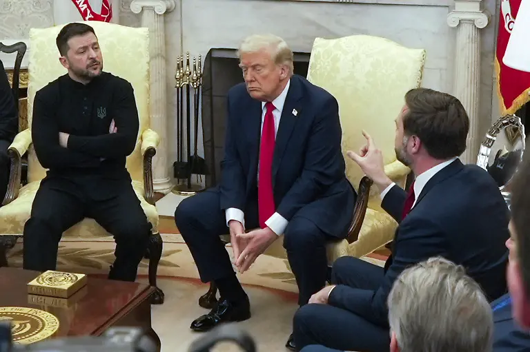 FILE-Vice-President-JD-Vance-right-speaks-with-Ukrainian-President-Volodymyr-Zelenskyy-left-as-President-Donald-Trump-listens-in-the-Oval-Office-at-the-White-House-Feb-28-2025-in-Washington
