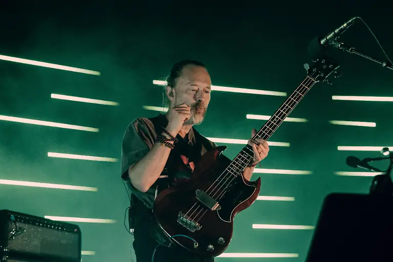 Thom-Yorke-frontman-of-Radiohead-pictured-during-a-live-performance-Yorke-is-currently-in-the-spotlight-amid-renewed-interest-in-Radiohead-and-side-projects-such-as-The-Smile-with-fans-anticipating-further-announcements-from-the-legendary-alternative-rock-band