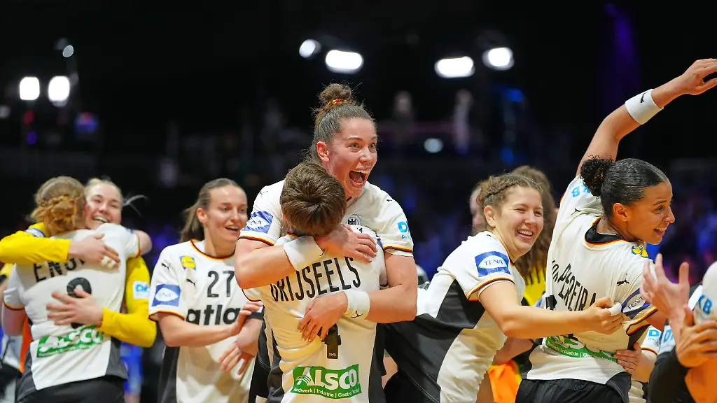 Germany-players-celebrate-their-victory-at-the-end-of-the-women-s-handball-World-Championship-semifinal-match-between-France-and-Germany-in-Rotterdam-Netherlands-Friday-Dec-12-2025