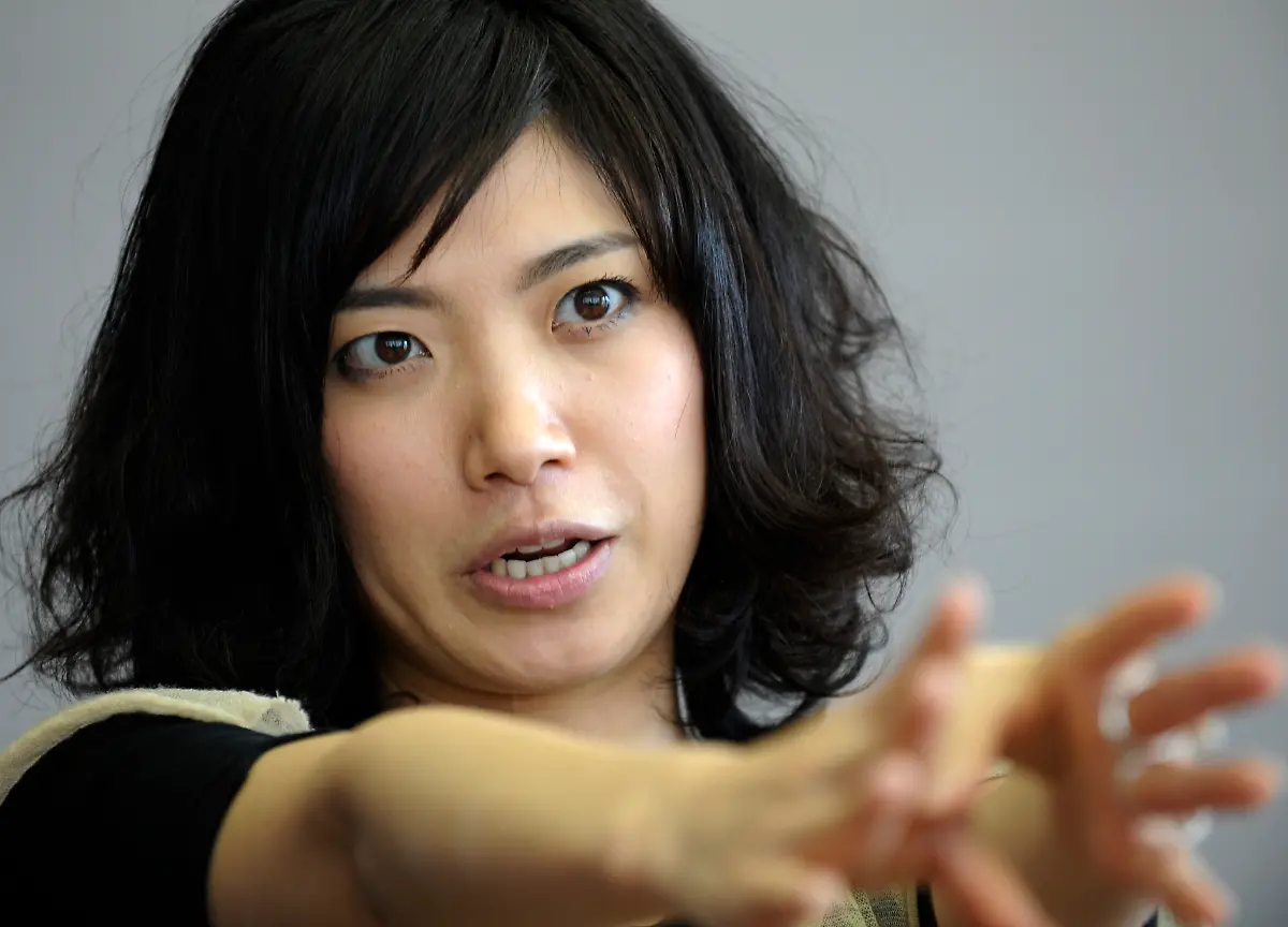 FILE-Japanese-writer-Mieko-Kawakami-answers-questions-during-an-interview-with-The-Associated-Press-in-Tokyo-Wednesday-March-5-2008-Just-a-few-months-ago-Kawakami-was-just-another-obscure-singer-Today-she-is-Japan-s-biggest-literary-star-all-because-of-a-blog-she-started-rather-casually-to-promote-her-concerts-and-CDs