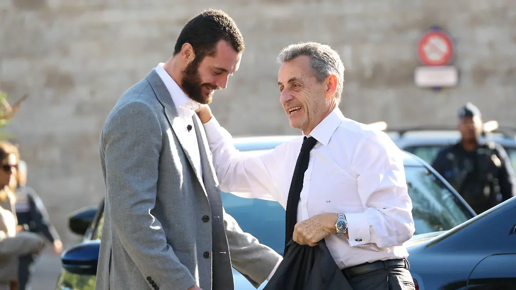 Nicolas-Sarkozy-And-Son-At-Public-Book-Signing-France-Former-French-President-Nicolas-Sarkozy-with-his-son-Louis-Sarkozy-arrive-at-a-public-book-signing-event-for-his-book-Le-journal-d-un-prisonnier-A-Prisoner-s-Diary-at-the-Librairie-de-la-Presse-bookstore-in-Menton-France-on-December-12-2025-Photo-by-Jean-Charles-Vinaj-ABACAPRESS