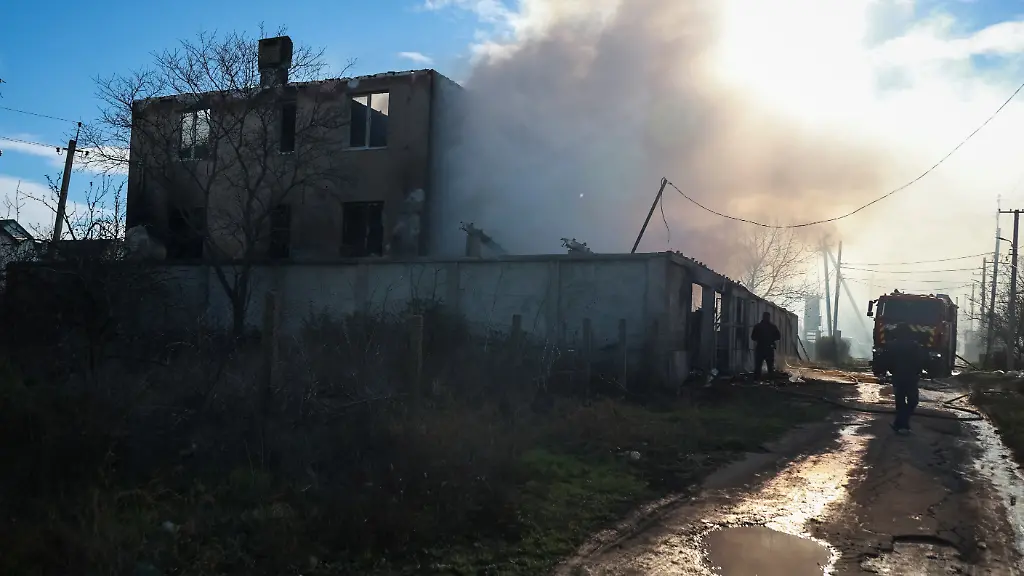Firefighters-work-at-the-site-of-a-Russian-missile-and-drone-strike-amid-Russia-s-attack-on-Ukraine-in-Odesa-Ukraine-December-13-2025