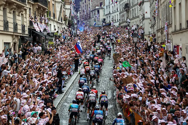Cycling-Tour-de-France-Stage-21-Mantes-la-Ville-to-Paris-Paris-France-July-27-2025-General-view-as-spectators-react-as-they-watch-riders-in-action-during-Stage-21-REUTERS-Abdul-Saboor-TPX-IMAGES-OF-THE-DAY-SEARCH-REUTERS-BEST-SPORTS-2025-FOR-THIS-STORY-SEARCH-REUTERS-YEAR-END-FOR-ALL-2025-YEAR-END-GALLERIES
