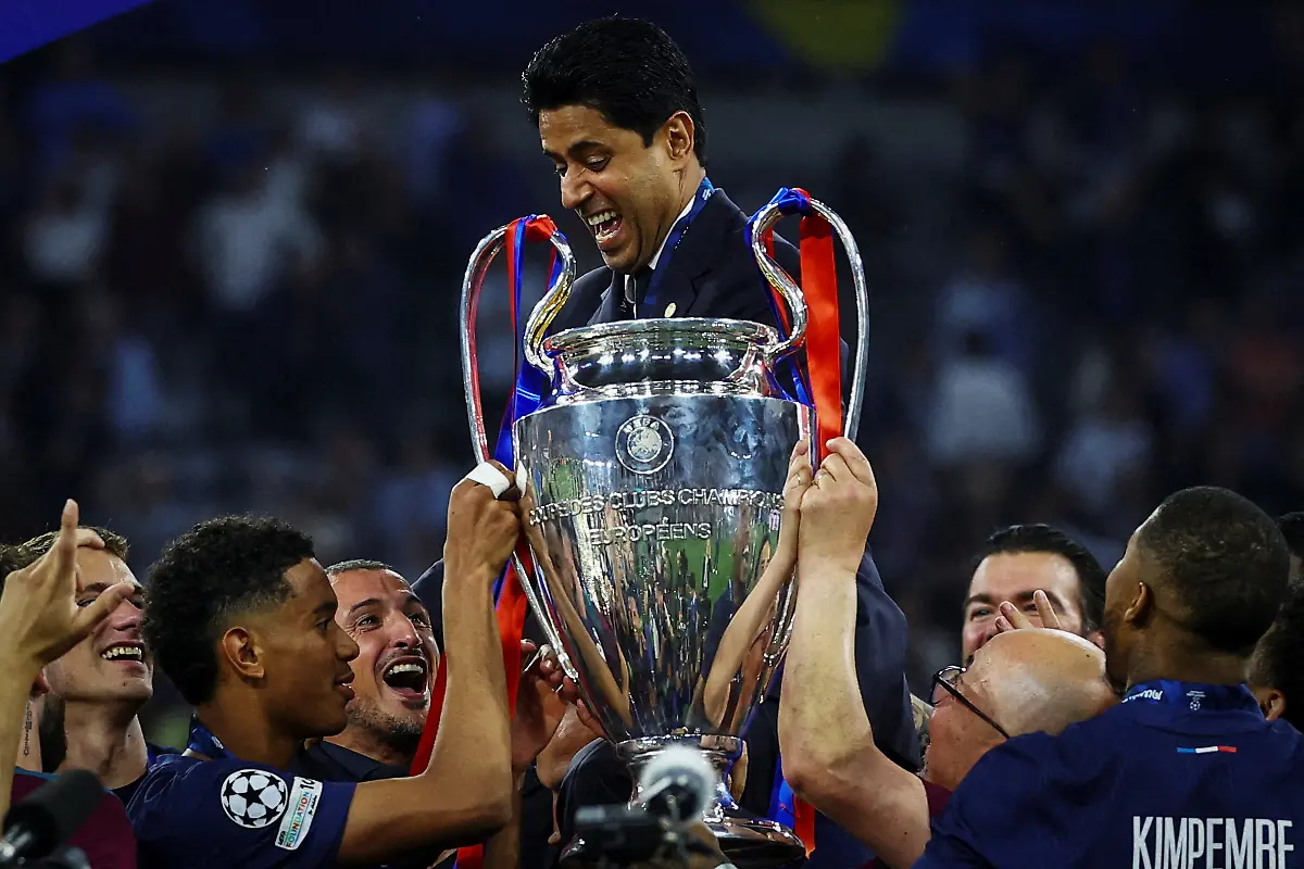 Soccer-Football-Champions-League-Final-Paris-St-Germain-v-Inter-Milan-Allianz-Arena-Munich-Germany-May-31-2025-Paris-St-Germain-president-Nasser-Al-Khelaifi-and-their-players-celebrate-after-winning-the-Champions-League-REUTERS-Kai-Pfaffenbach-TPX-IMAGES-OF-THE-DAY-SEARCH-REUTERS-BEST-SPORTS-2025-FOR-THIS-STORY-SEARCH-REUTERS-YEAR-END-FOR-ALL-2025-YEAR-END-GALLERIES