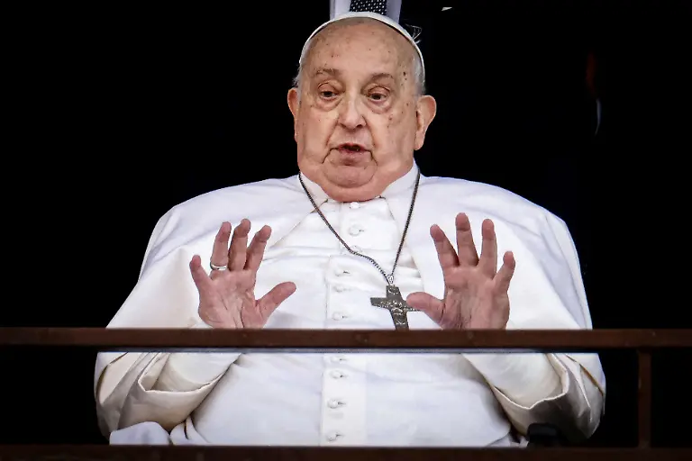 Pope-Francis-gestures-during-his-first-public-appearance-in-five-weeks-on-the-day-he-is-set-to-be-discharged-from-Gemelli-Hospital-in-Rome-Italy-March-23-2025-REUTERS-Yara-Nardi-TPX-IMAGES-OF-THE-DAY-SEARCH-REUTERS-BEST-2025-FOR-THIS-STORY-SEARCH-REUTERS-2025-YEAR-END-FOR-ALL-2025-YEAR-END-GALLERIES