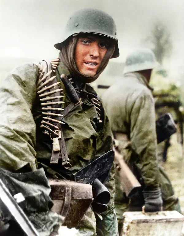 World-War-II-Battle-of-the-Bulge-Ardennes-Offensive-last-major-German-offensive-campaign-on-the-Western-Front-December-1944-January-1945-German-SS-Panzer-trooper-geared-for-winter-battle-during-the-the-Battle-of-the-Bulge-Captured-Germand-photo-Photo-December-1944