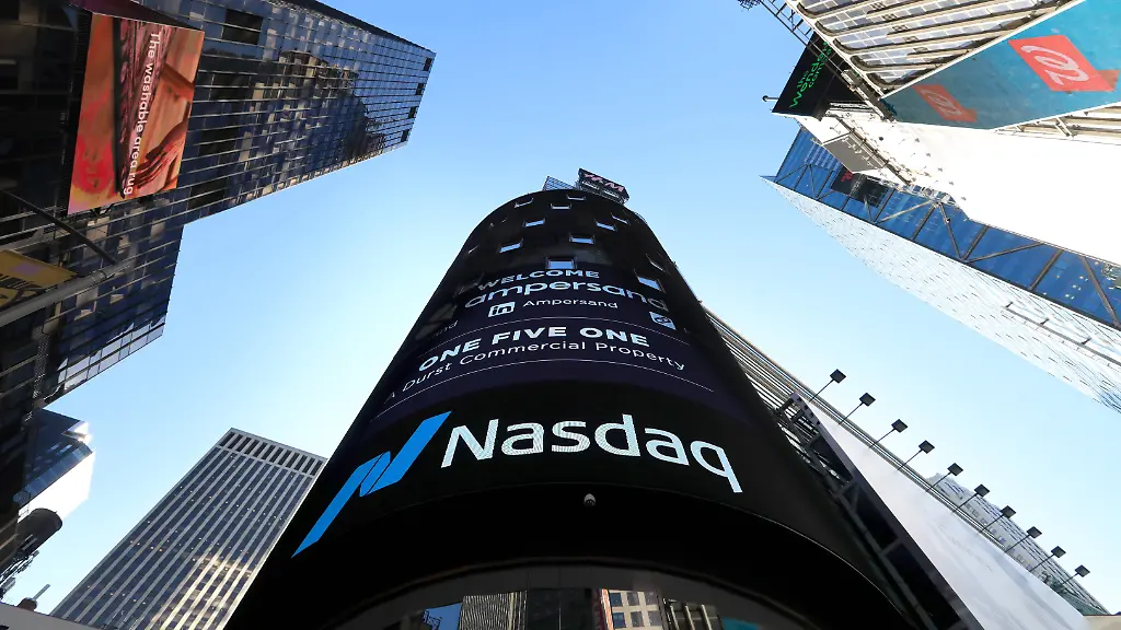 NEW-YORK-CITY-UNITED-STATES-OCTOBER-15-2015-The-Nasdaq-stock-exchange-centre-at-the-crossing-of-Broadway-and-West-43rd-Street-Freedom-Holding-Corporation-a-retail-brokerage-and-investment-bank-registered-in-the-United-States-with-operating-subsidiaries-in-Russia-under-the-brand-of-Freedom-Finance-Eastern-Europe-and-Central-Asia-has-began-trading-its-shares-at-the-Nasdaq-Stock-Market