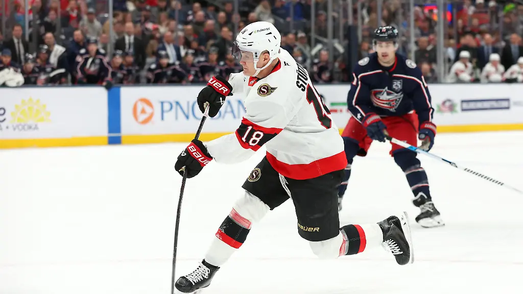 Dec-11-2025-Columbus-Ohio-USA-Ottawa-Senators-center-Tim-Stuetzle-18-shoots-the-puck-and-scores-on-the-play-during-the-first-period-against-the-Columbus-Blue-Jackets-at-Nationwide-Arena