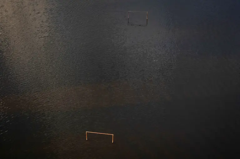 A-drone-view-shows-soccer-goal-posts-partially-submerged-in-flood-waters-caused-by-heavy-rains-in-Campana-Buenos-Aires-Argentina-May-18-2025-REUTERS-Martin-Cossarini-TPX-IMAGES-OF-THE-DAY-SEARCH-REUTERS-BEST-2025-FOR-THIS-STORY-SEARCH-REUTERS-2025-YEAR-END-FOR-ALL-2025-YEAR-END-GALLERIES
