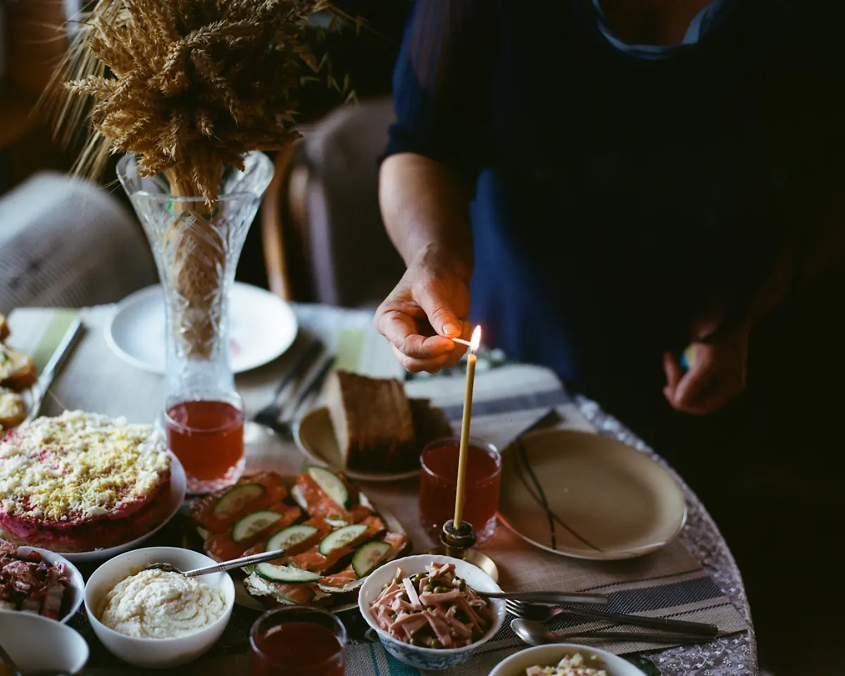 My-grandmother-Maria-lights-up-a-candle-at-the-Christmas-table-Karpivtsi-village-Khmelnytskyi-region