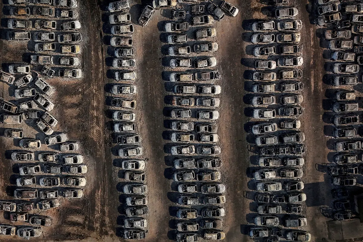 A-drone-view-shows-burnt-cars-following-a-wildfire-in-Dymi-near-Patras-Greece-August-14