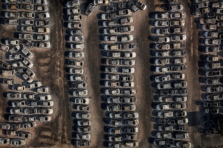 A-drone-view-shows-burnt-cars-following-a-wildfire-in-Dymi-near-Patras-Greece-August-14