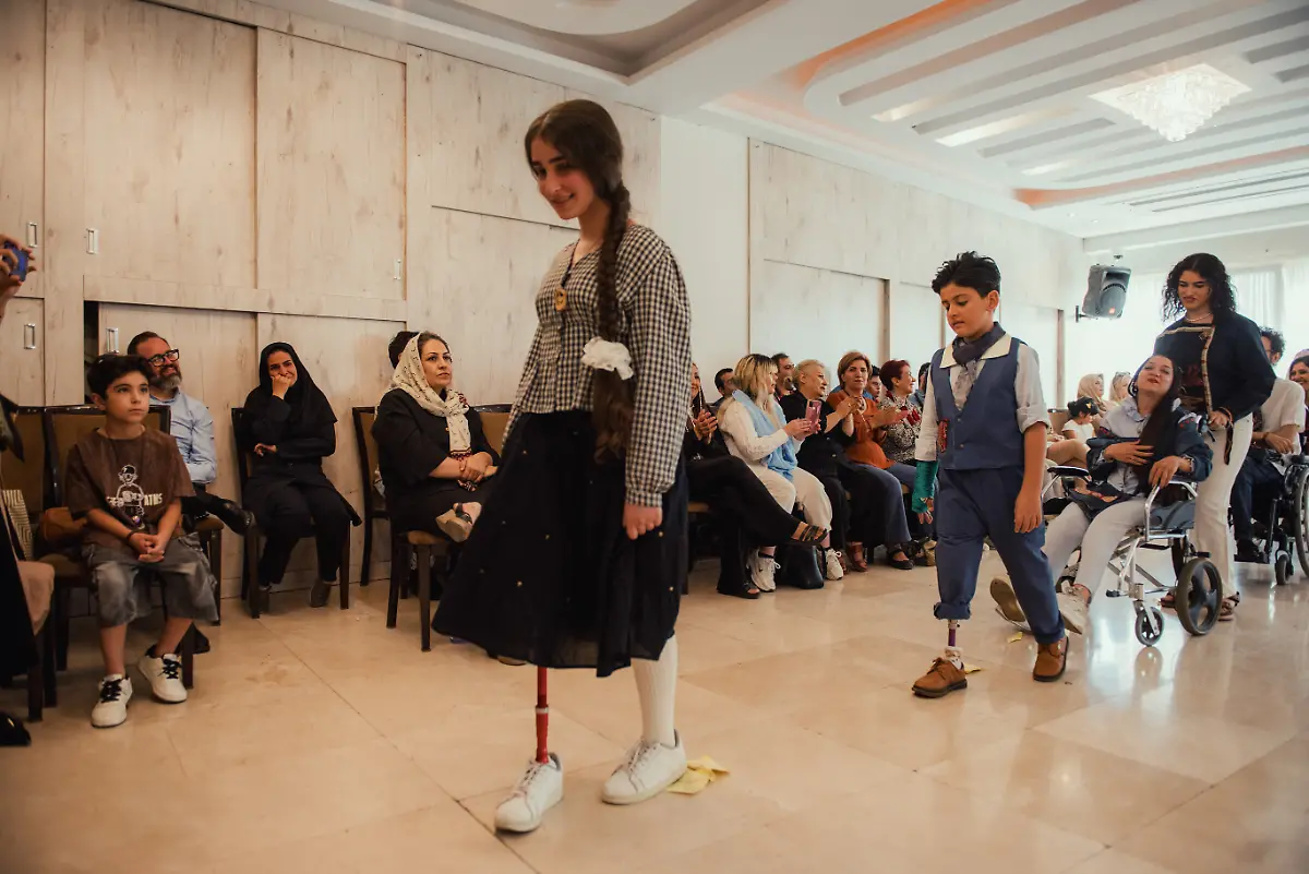 Children-and-young-participants-with-disabilities-take-part-in-a-catwalk-event-organized-by-the-Mahboob-Tehran-Institute-in-Tehran-Iran-on-September-9-2025-The-organization-led-by-Mahboubeh-Rahimian-works-to-support-people-with-disabilities-and-promote-social-inclusion-through-art-education-and-community-events