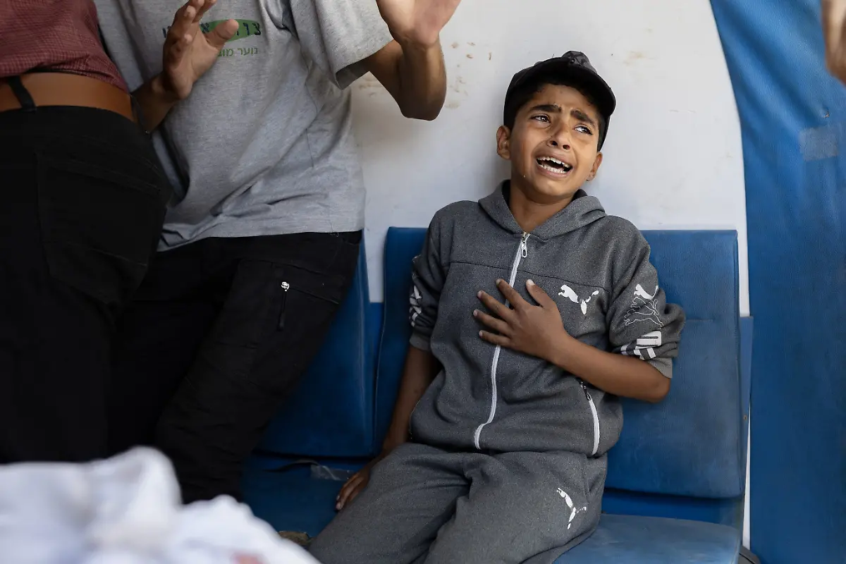 NYTCEASEFIRE-May-15-2025-Jabaliya-Camp-Victims-of-an-airstrike-in-Jabaliya-in-northern-Gaza-were-brought-to-the-Indonesian-Hospital-This-boy-s-father-was-killed-in-a-strike-Some-of-the-victims-were-from-a-strike-on-a-building-that-housed-Al-Tawbah-Health-Clinic-in-the-Al-Fakhoura-area-of-Jabaliya-Camp