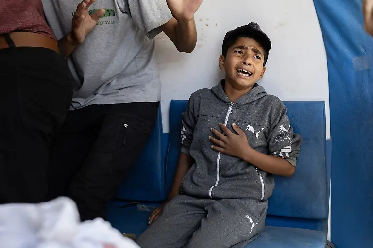 NYTCEASEFIRE-May-15-2025-Jabaliya-Camp-Victims-of-an-airstrike-in-Jabaliya-in-northern-Gaza-were-brought-to-the-Indonesian-Hospital-This-boy-s-father-was-killed-in-a-strike-Some-of-the-victims-were-from-a-strike-on-a-building-that-housed-Al-Tawbah-Health-Clinic-in-the-Al-Fakhoura-area-of-Jabaliya-Camp