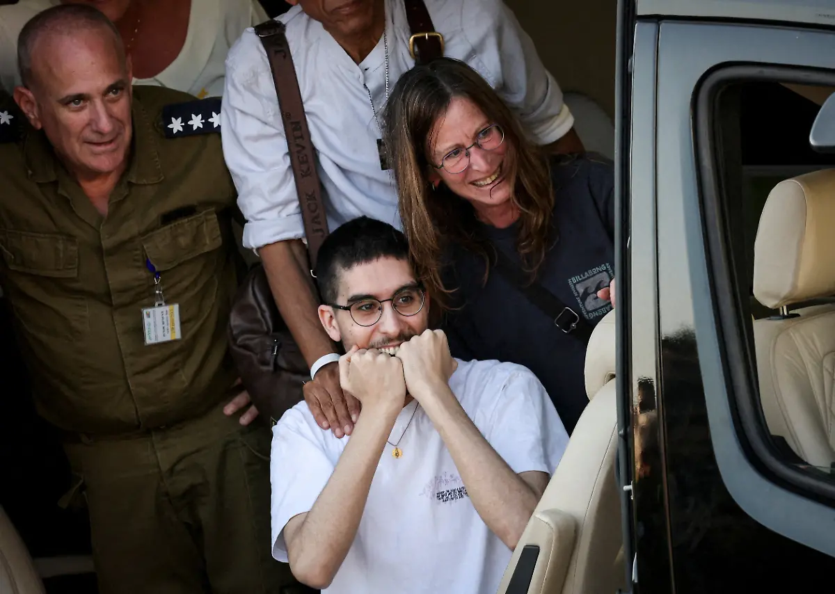 Released-hostage-Evyatar-David-who-was-kidnapped-during-the-deadly-October-7-2023-attack-by-Hamas-and-taken-to-Gaza-reacts-upon-arrival-at-the-site-of-Rabin-Medical-Center-Beilinson-Hospital-amid-a-hostages-prisoners-swap-and-a-ceasefire-deal-between-Israel-and-Hamas-in-Gaza-in-Petah-Tikva-Israel-October-13-2025-REUTERS-Stoyan-Nenov-TPX-IMAGES-OF-THE-DAY-SEARCH-REUTERS-BEST-2025-FOR-THIS-STORY-SEARCH-REUTERS-2025-YEAR-END-FOR-ALL-2025-YEAR-END-GALLERIES