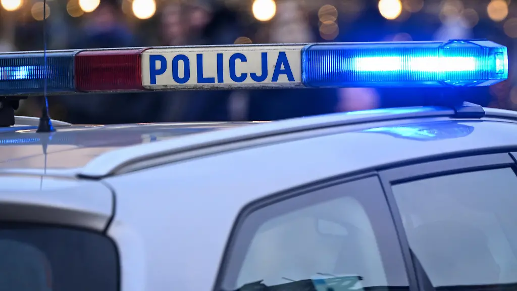 KRAKOW-POLAND-a-DECEMBER-14-Members-of-the-local-police-monitor-the-Anti-Fascist-March-in-central-Krakow-Lesser-Poland-Voivodeship-Poland-on-December-14-2025-The-march-held-on-the-103rd-anniversary-of-the-assassination-of-Polandas-first-president-Gabriel-Narutowicz-was-organized-to-protest-nationalism-xenophobia-and-hate-speech-and-to-show-solidarity-with-Ukraineas-minority-community