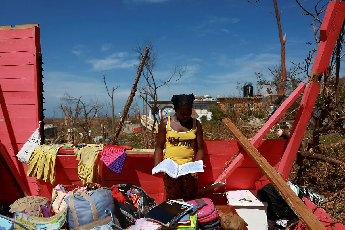 Andrieneke-Hyman-13-looks-at-her-wet-notebook-in-her-damaged-room-in-the-aftermath-of-Hurricane-Melissa-in-Auchindown-Saint-Elizabeth-Parish-Jamaica-November-3-2025-REUTERS-Raquel-Cunha-TPX-IMAGES-OF-THE-DAY-SEARCH-REUTERS-BEST-2025-FOR-THIS-STORY-SEARCH-REUTERS-2025-YEAR-END-FOR-ALL-2025-YEAR-END-GALLERIES