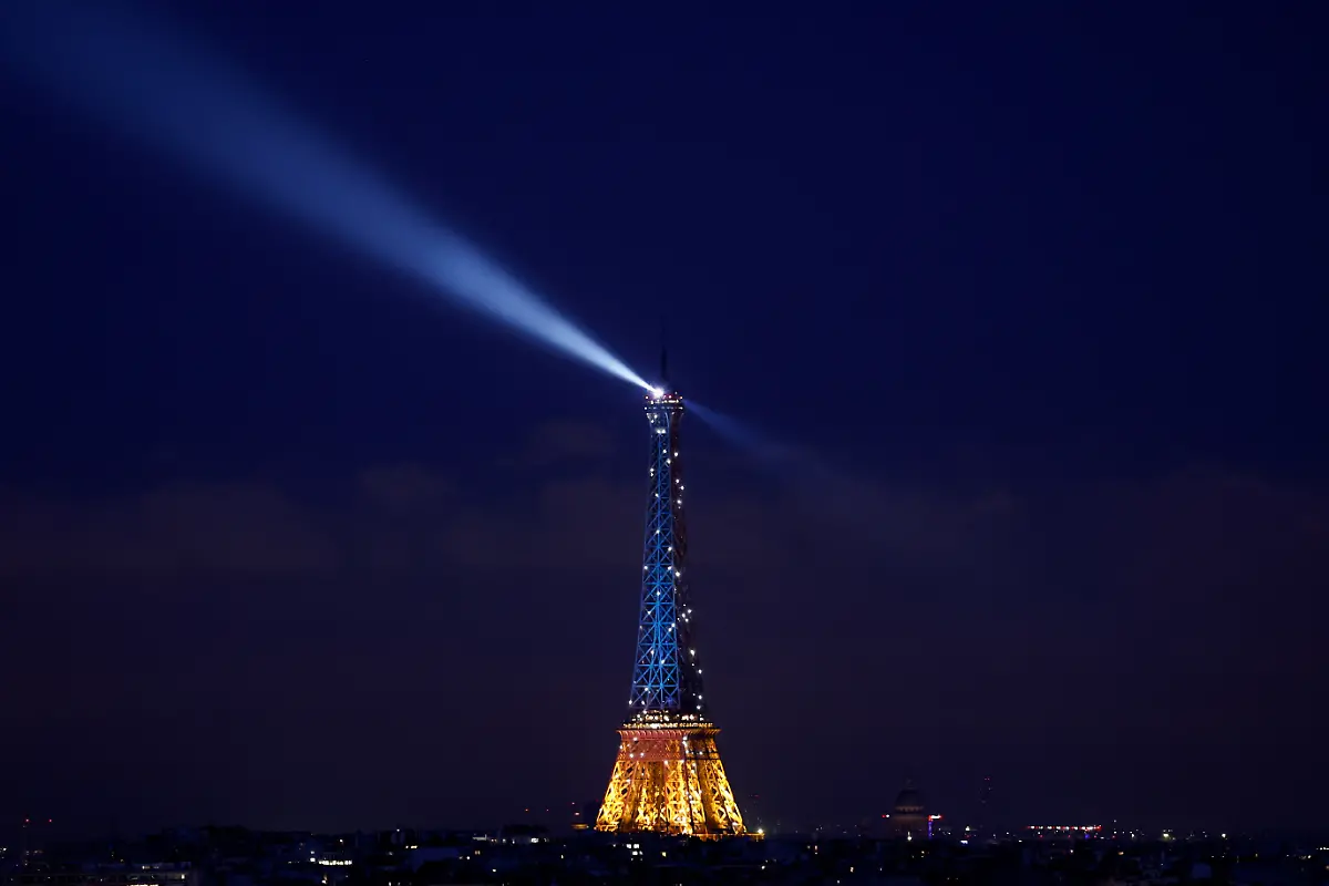 The-Eiffel-Tower-is-lit-up-in-blue-and-yellow-the-national-colours-of-Ukraine-to-mark-the-third-anniversary-of-Russia-s-invasion-of-Ukraine-in-Paris-France-February-24