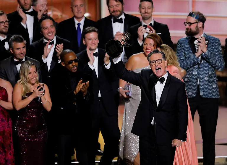 Stephen-Colbert-accepts-the-award-for-Outstanding-Variety-Talk-Series-award-for-The-Late-Show-with-Stephen-Colbert-at-the-77th-Primetime-Emmy-Awards-in-Los-Angeles-California-September-14
